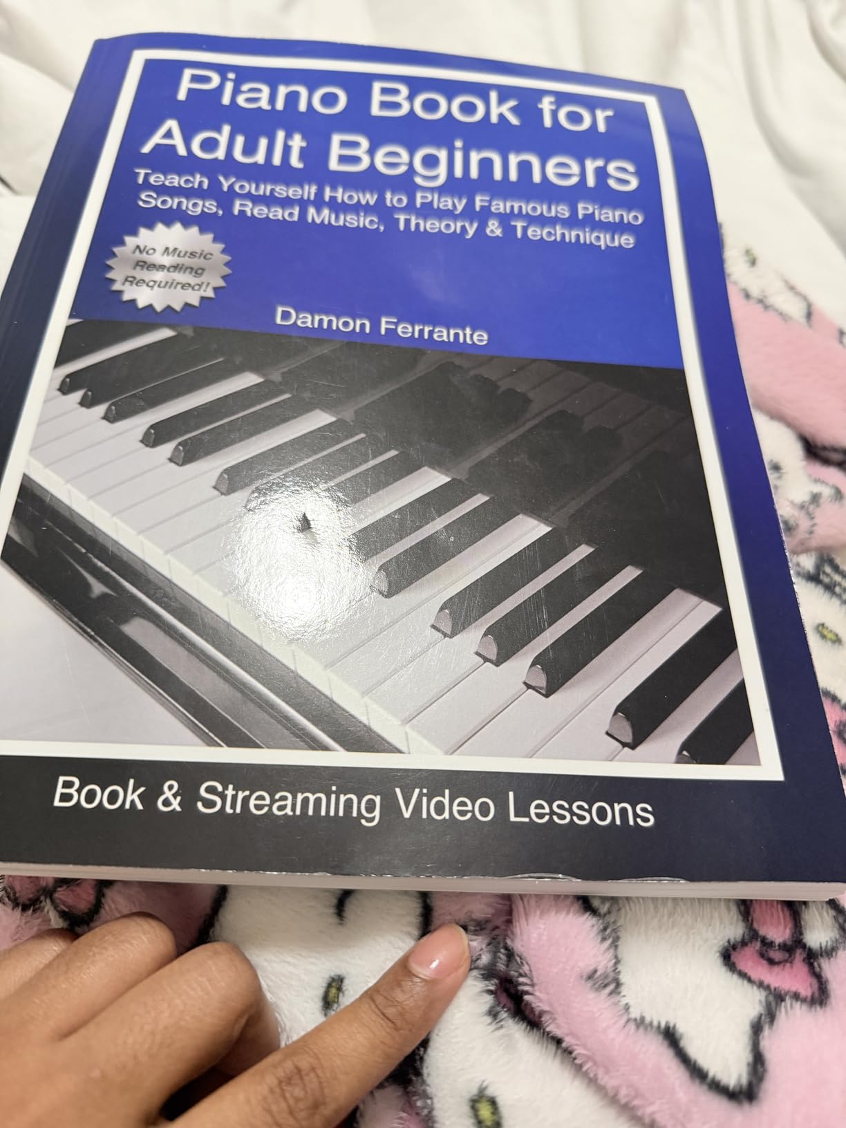Piano Book for Adult Beginners: Teach Yourself How to Play Famous Piano Songs, Read Music, Theory & Technique (Book & Streaming Video Lessons) customer photo 1