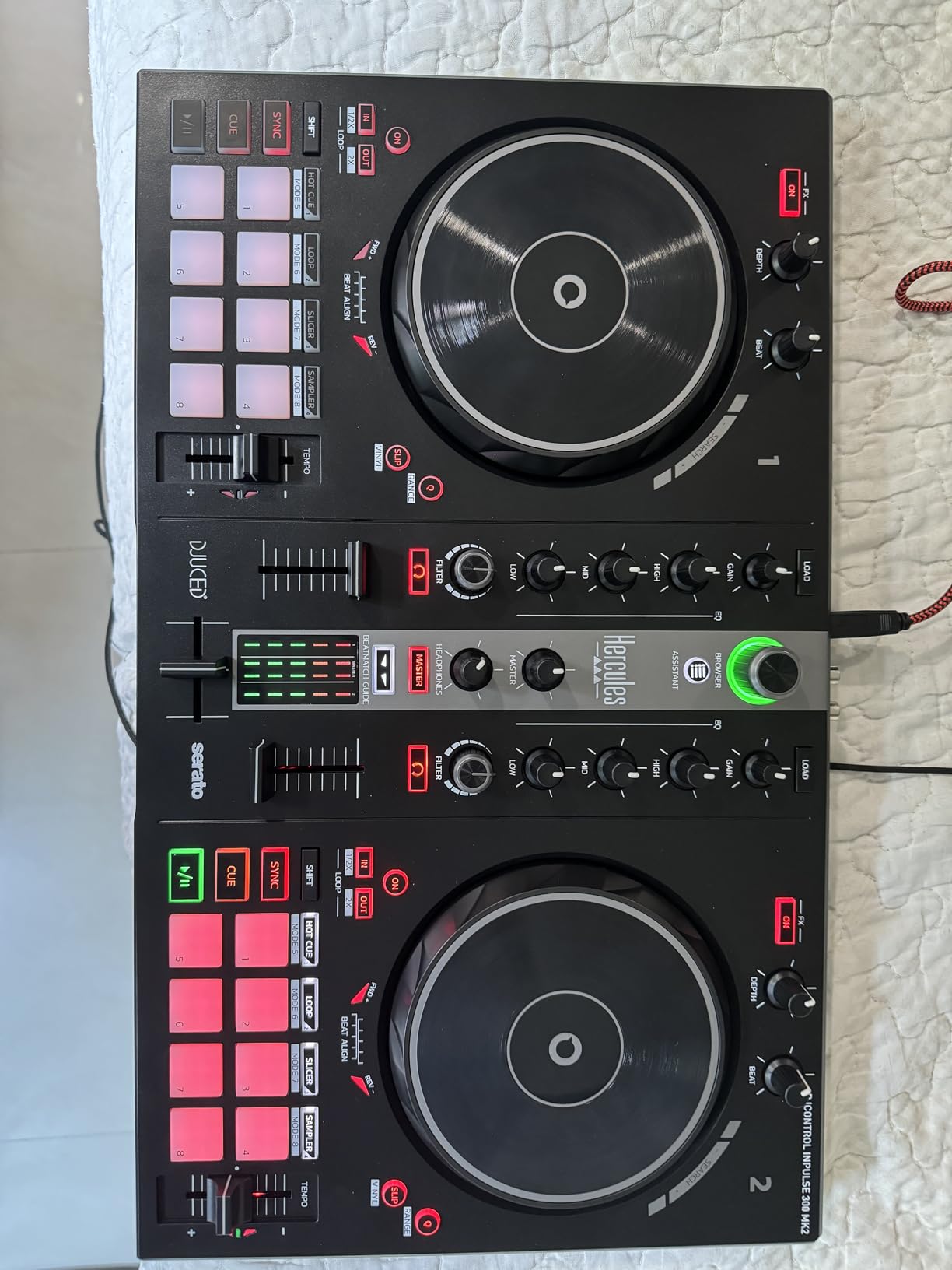 Hercules DJControl Inpulse 300 MK2 - 2 Deck DJ Controller Serato & DJUCED | 2-deck DJ controller for Serato & DJUCED featuring Beatmatch Guide LEDs, 16 performance pads & pre-mapped Stems control customer photo 1