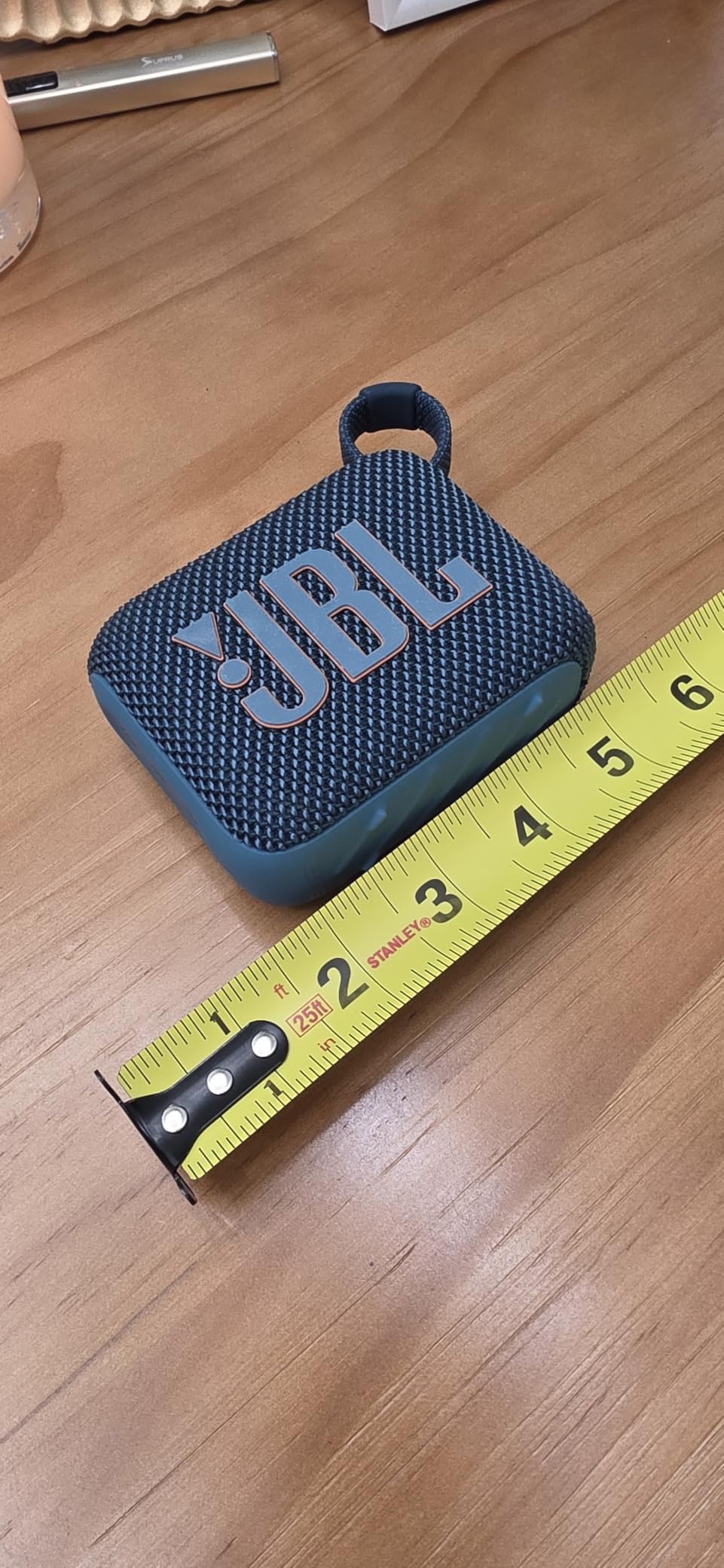 JBL Go 4 - Ultra-Portable, Waterproof and Dustproof Bluetooth Speaker, Big JBL Pro Sound with Punchy bass, 7-Hour Built-in Battery, Made in Part with Recycled Materials (Black) customer photo 1