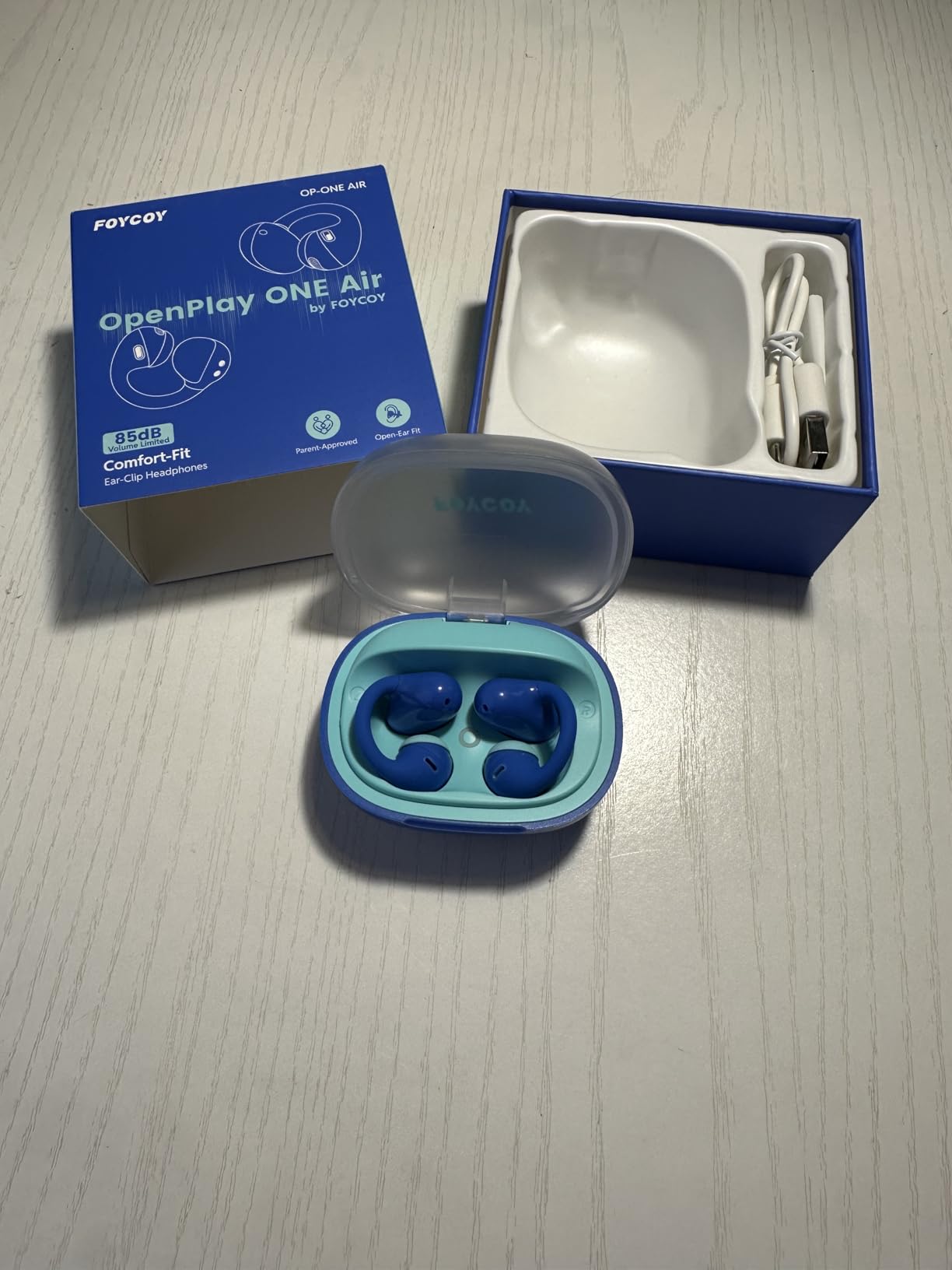 FOYCOY Kids Open Ear Earbuds - Clip-On Earbuds - 85 dB Volume Limit - Bluetooth 6.0, Built-in Mic, 40H Playtime, Silicone Pads, IPX5, Small Ears and Glasses Friendly, Ages 6-14, Navy Blue customer photo 1