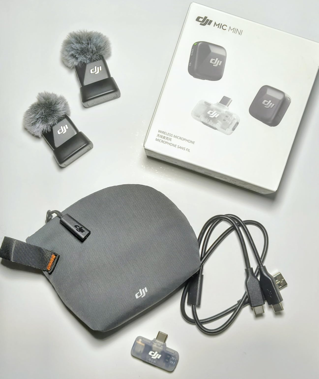DJI Mic Mini (2 TX + 1 Mobile RX), Wireless Lavalier Microphone for iPhone 17/16/15 & Android/PC/Tablet, Plug-and-Play, 300m Transmission, Ultralight, Active Noise Cancelling, YouTube, Vlog, Streaming customer photo 1