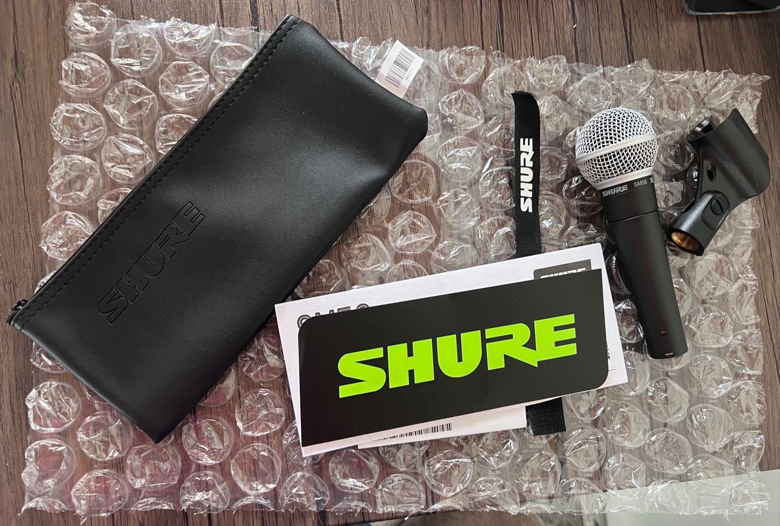 Shure SM58 Pro Dynamic Vocal Microphone with 25-ft XLR Cable | Cardioid dynamic vocal mic for studio, live performance, podcasting and recording; includes 25-ft XLR cable customer photo 1
