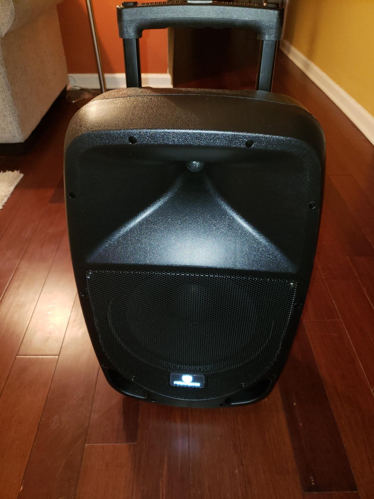 PRORECK Portable 12 Inch 1200W Powered PA/DJ Speaker System with Rechargeable Battery, 2 Wireless Mics, Bluetooth, USB, SD, FM Radio, Remote, Speaker Stand for Parties, Karaoke, speeches, Outdoor customer photo 1