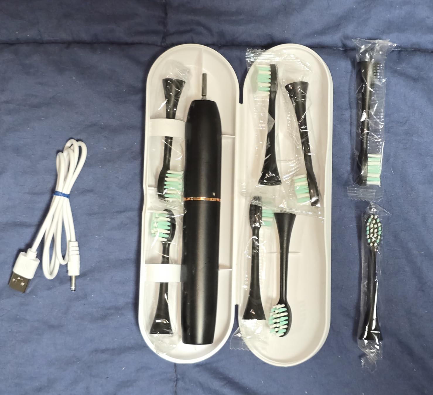 kingheroes Electric Toothbrush Set, Comes with 8 Brush Heads & Travel Case,4 Modes with 2 Minutes Built in Smart Timer, One Charge for 60 Days, 42000 VPM Motor (Black) customer photo 2