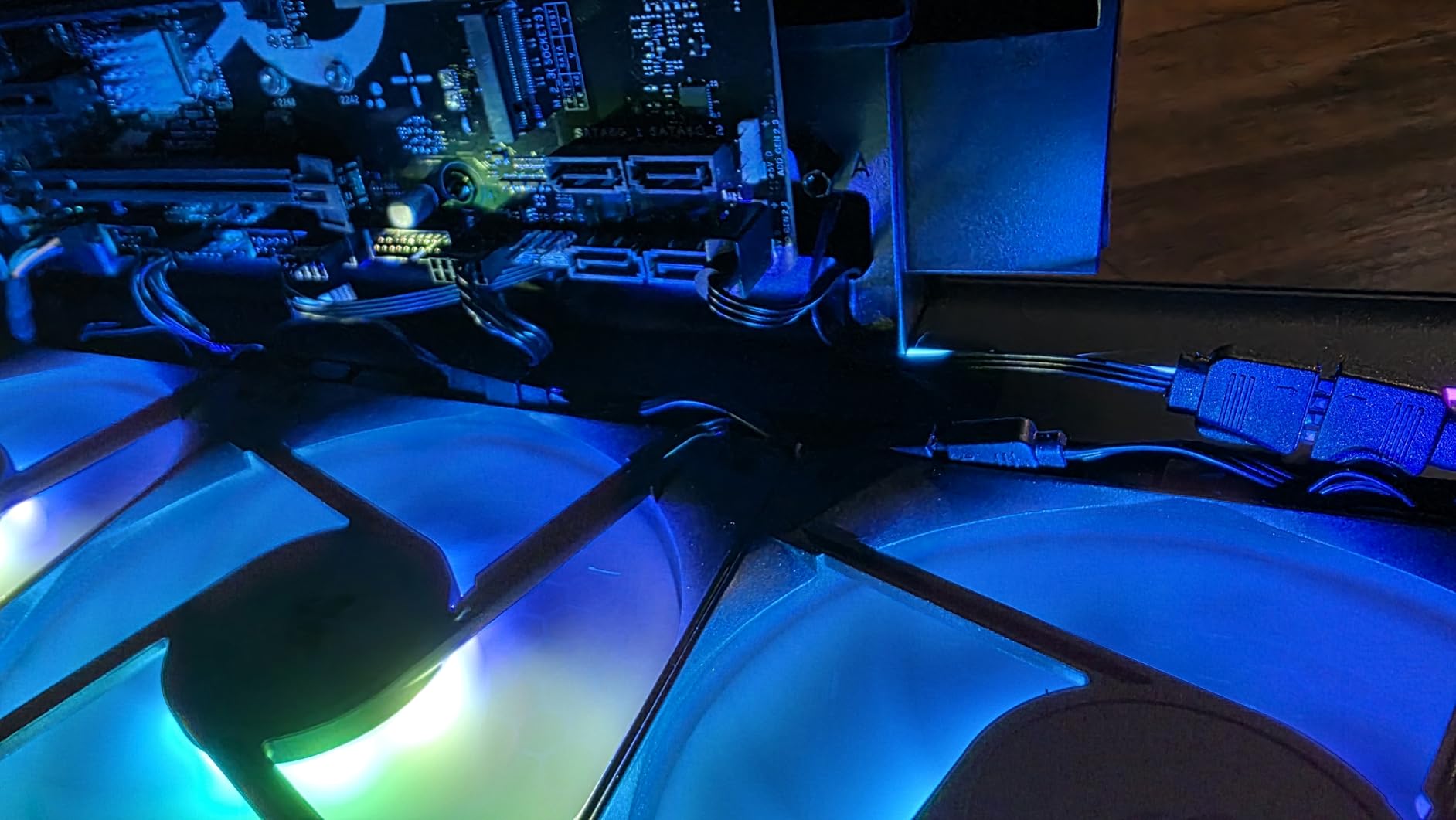 Corsair RS120-R ARGB 120mm PWM ARGB Reverse Fans – Reverse Rotor, +5V ARGB Connections, Eight RGB LEDs, High Static Pressure, Daisy-Chain, Magnetic Dome Bearing, Zero RPM Mode – Triple Pack – Black customer photo 1
