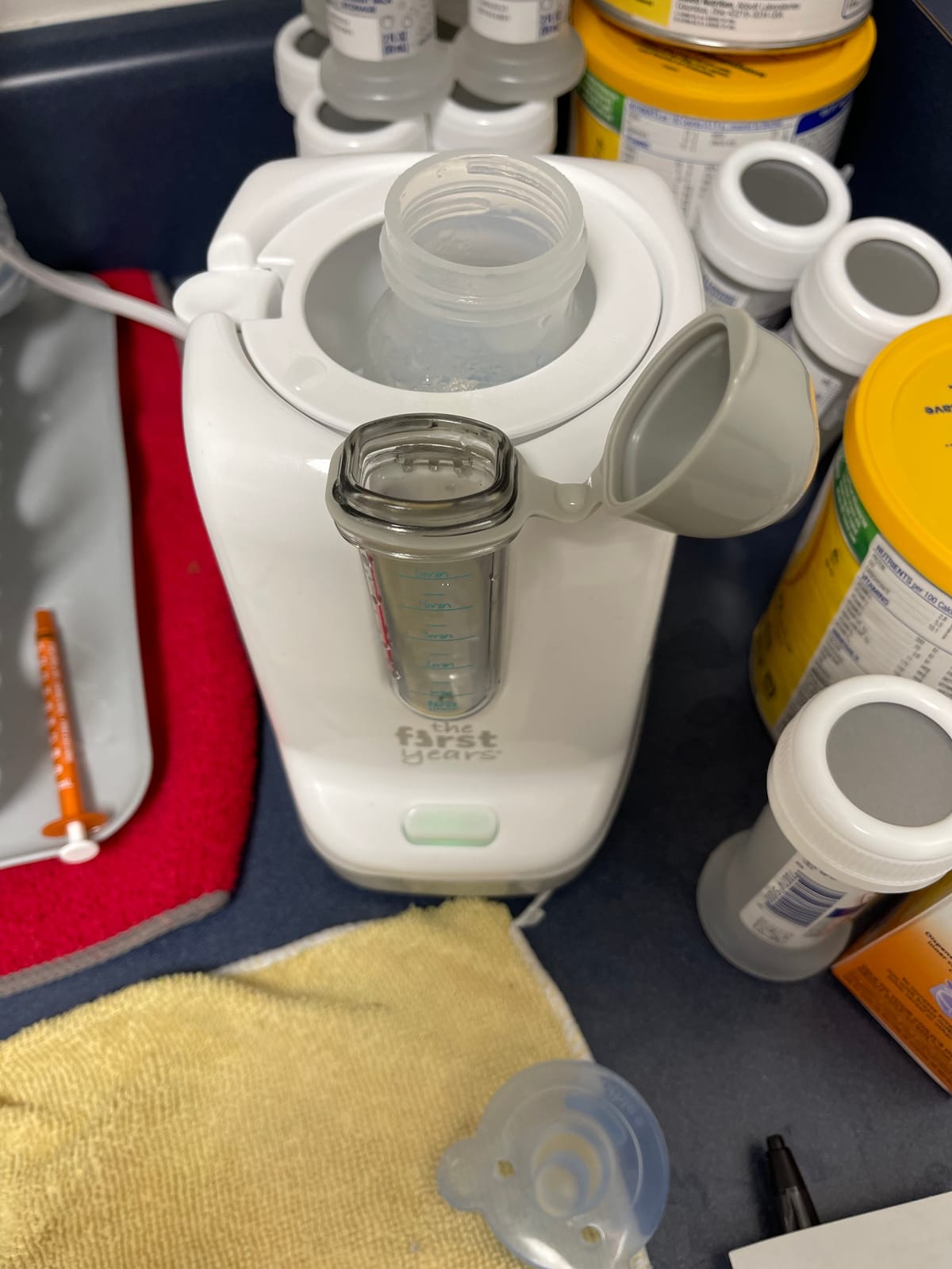The First Years Baby Bottle Warmer and Sterilizer - Pacifier and Bottle Nipple Sanitizer - Feeding Baby Essentials for Formula or Breast Milk - Holds Multiple Sizes customer photo 1